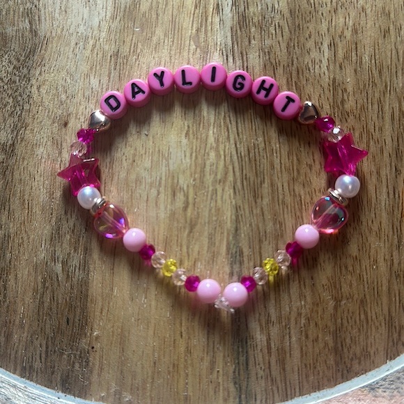 5 for $20 Taylor Swift Handmade Friendship Beaded Bracelet
“Daylight” - Picture 1 of 2